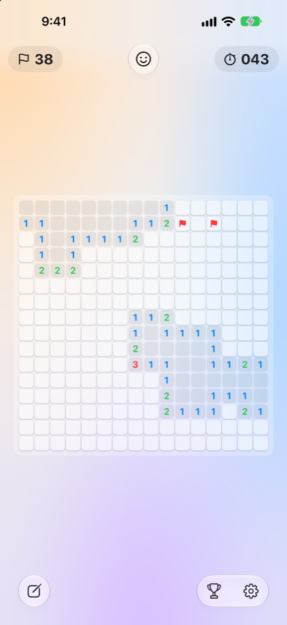 Minesweeper Duo on iPhone, mid-game in the Liquid Glass theme